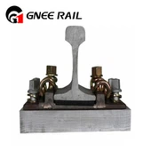 Sistema de fixação de espigões de trilho